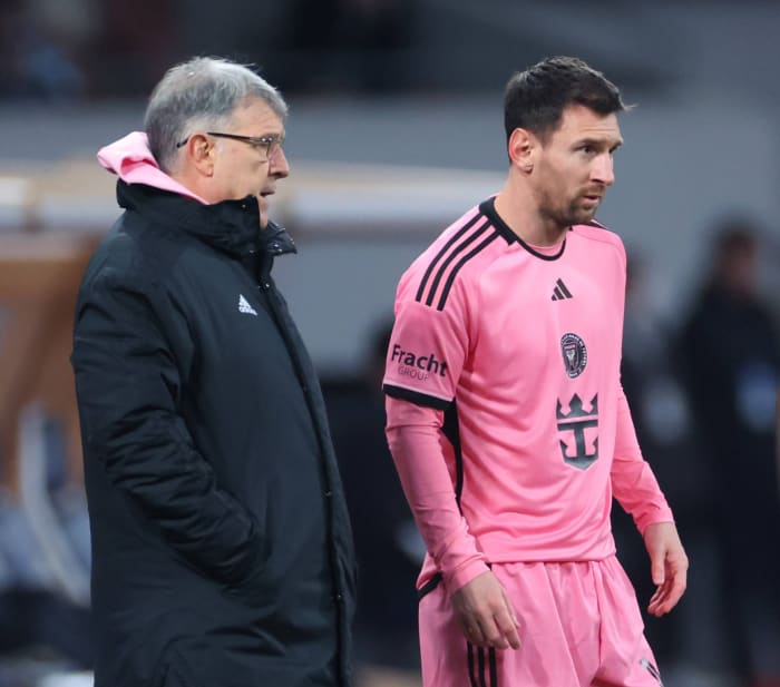 Inter Miami head coach Gerardo Martino (left) and club captain Lionel Messi pictured in February 2024 during a pre-season game in Japan